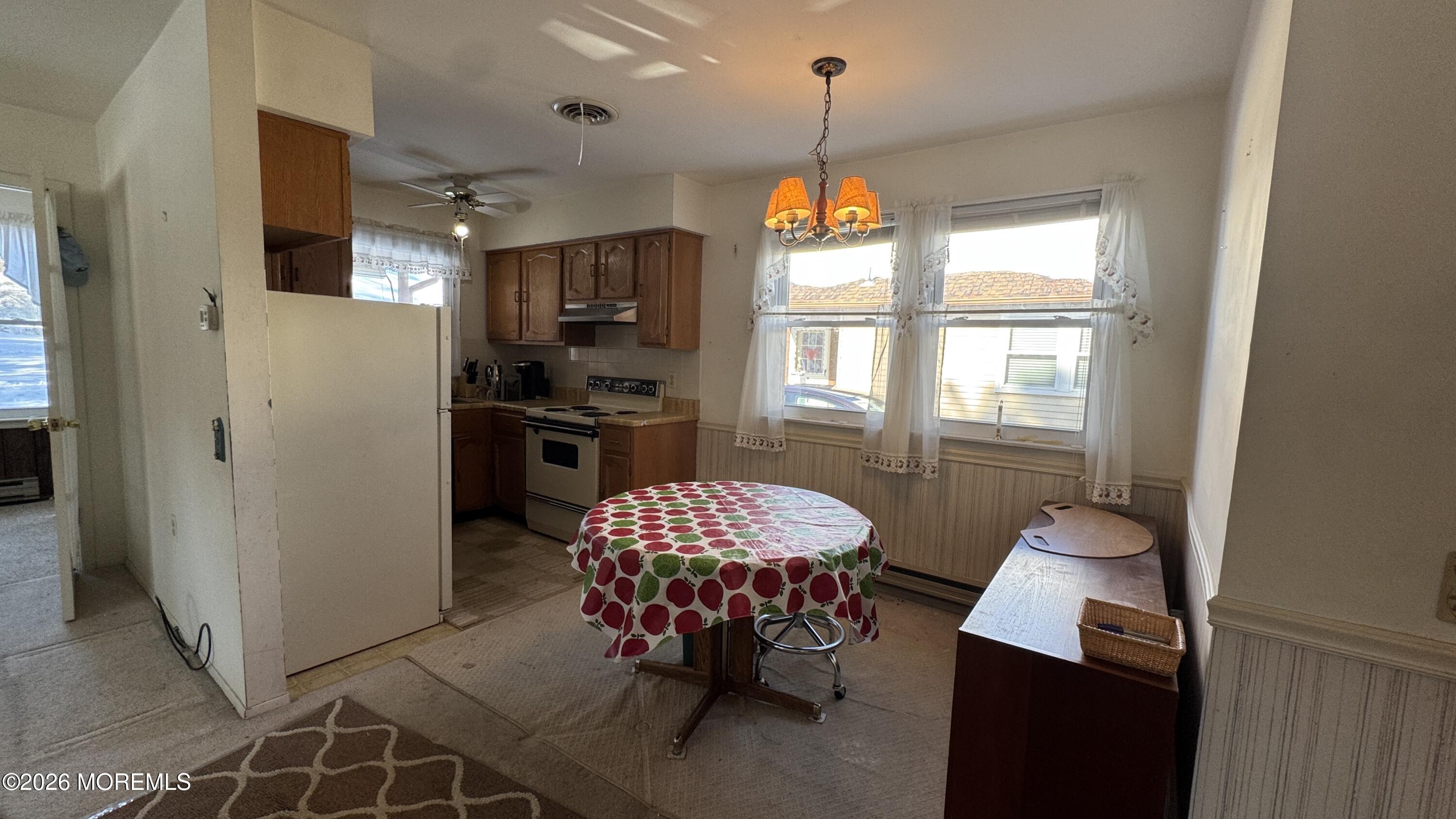 40A Stonybrook Road, Unit 62 Whiting, NJ 08759 - Photo 4 of 12 a view of a room with workspace and windows