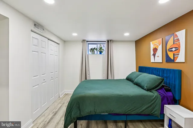 a bathroom with a sink a toilet and shower curtain
