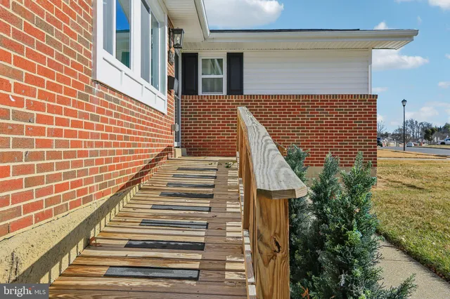 a view of a patio with wooden door