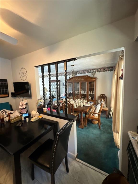 5366 Brownsville Road Pittsburgh, PA 15236 - Photo 11 of 20 a living room with furniture and a flat screen tv