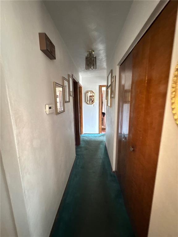 5366 Brownsville Road Pittsburgh, PA 15236 - Photo 13 of 20 a view of a hallway with windows