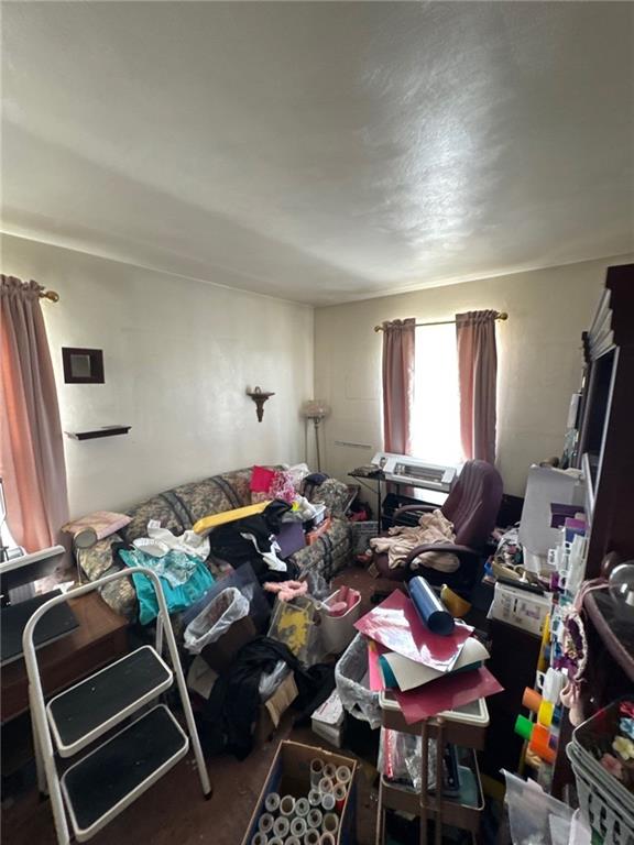 5366 Brownsville Road Pittsburgh, PA 15236 - Photo 16 of 20 a room with gym equipment and a window