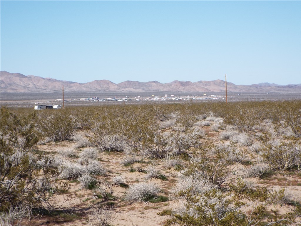 19557 North Wright Road Willow Beach, AZ 86445 - Photo 3 of 9 a view of a mountain with a lake