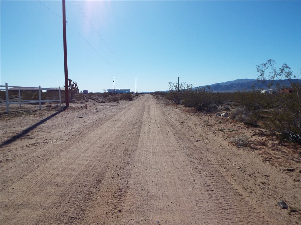19557 North Wright Road Willow Beach, AZ 86445 - Photo 6 of 9 a view of a dry field with a view of mountains