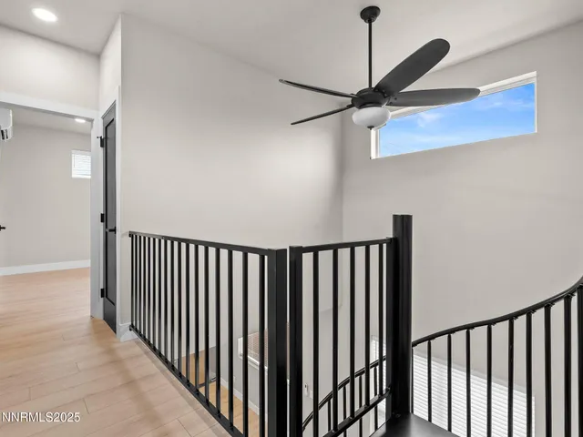 a view of a hallway with a chandelier