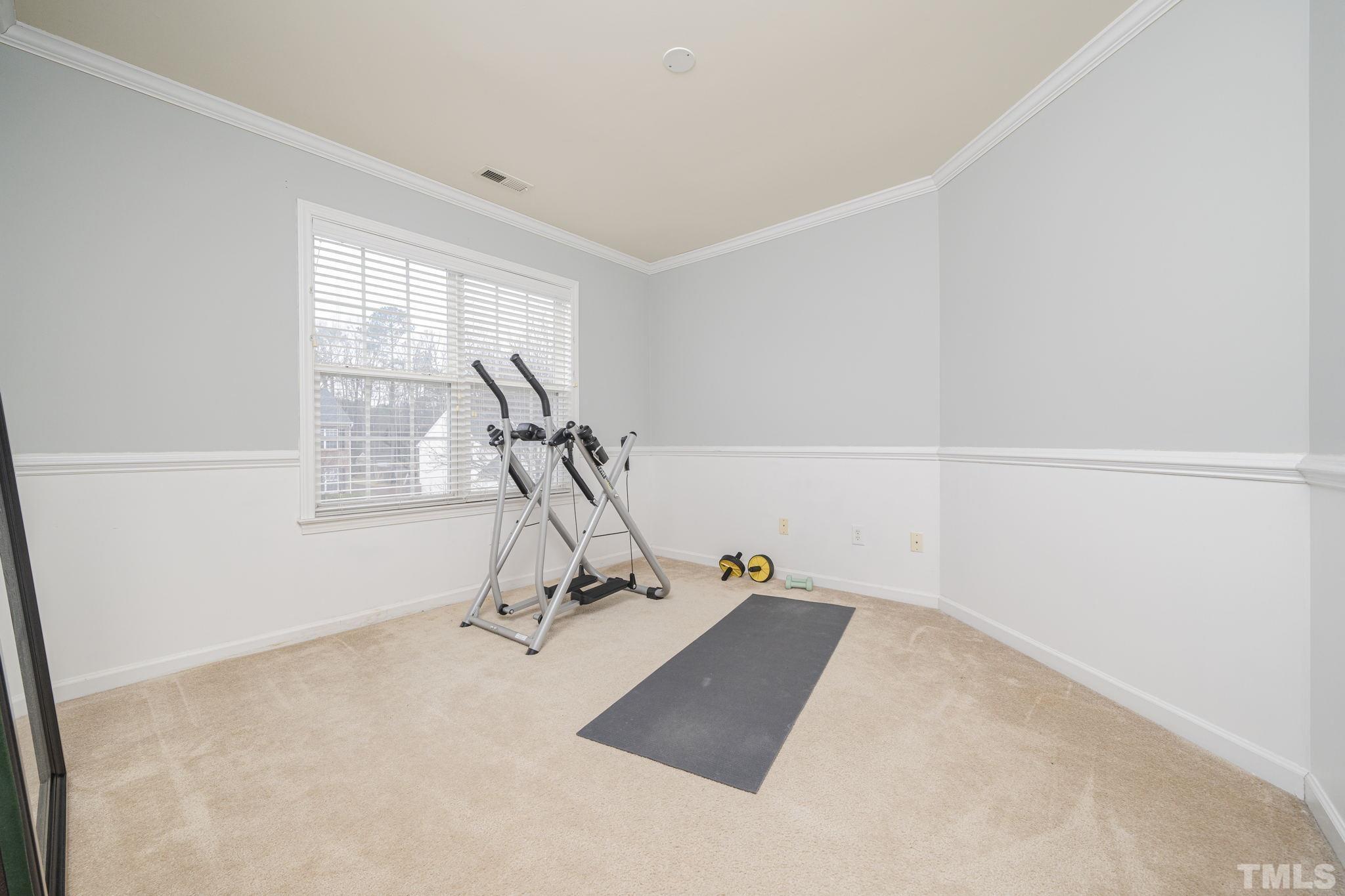 930 Pristine Lane Rolesville, NC 27571 - Photo 16 of 30 a view of a room with gym equipment