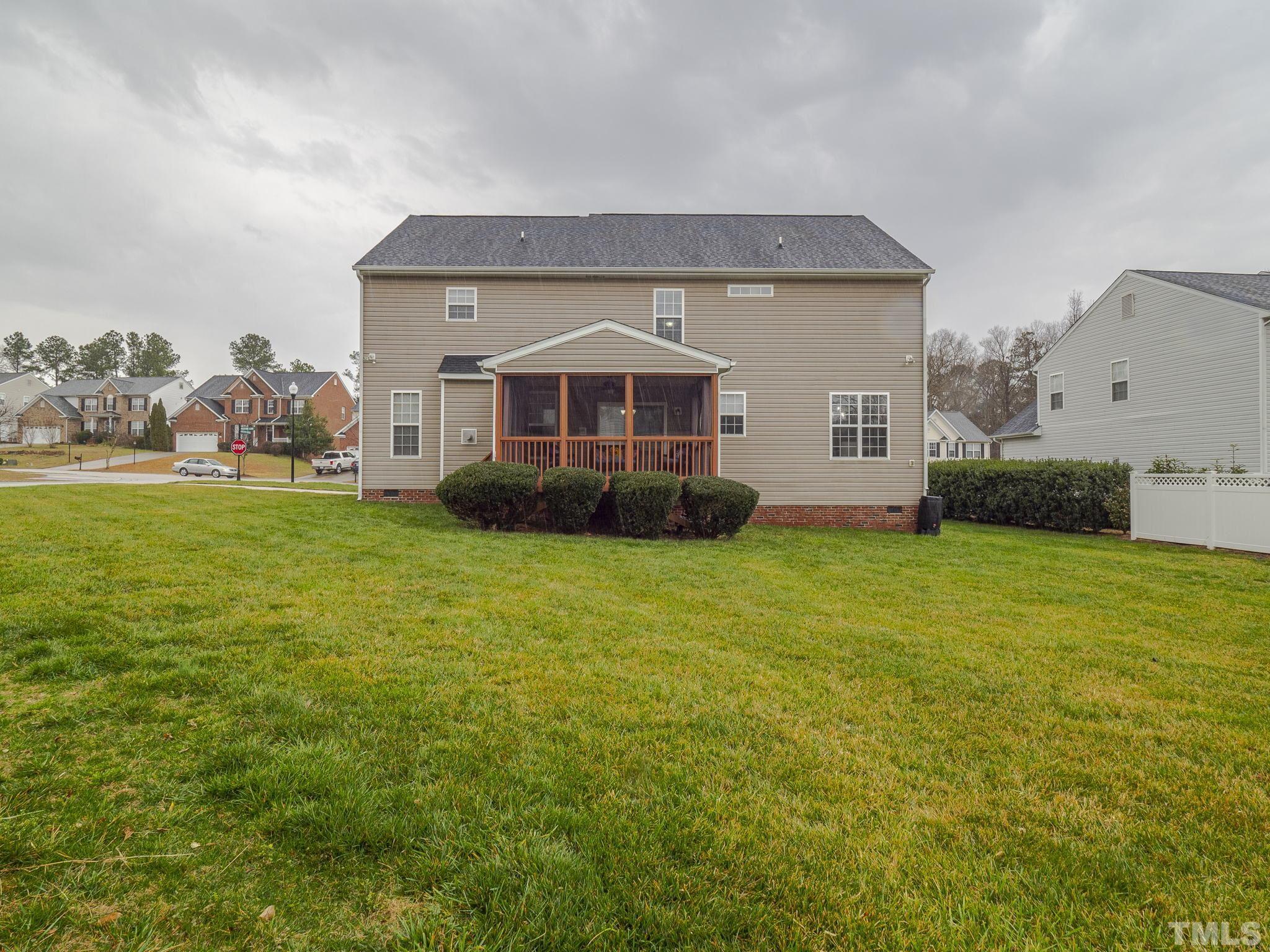 930 Pristine Lane Rolesville, NC 27571 - Photo 30 of 30 a front view of a house with garden