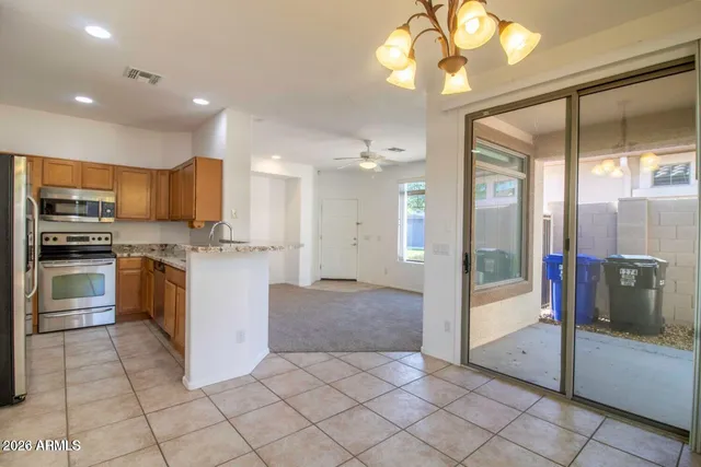 a kitchen with a sink a refrigerator and a sink