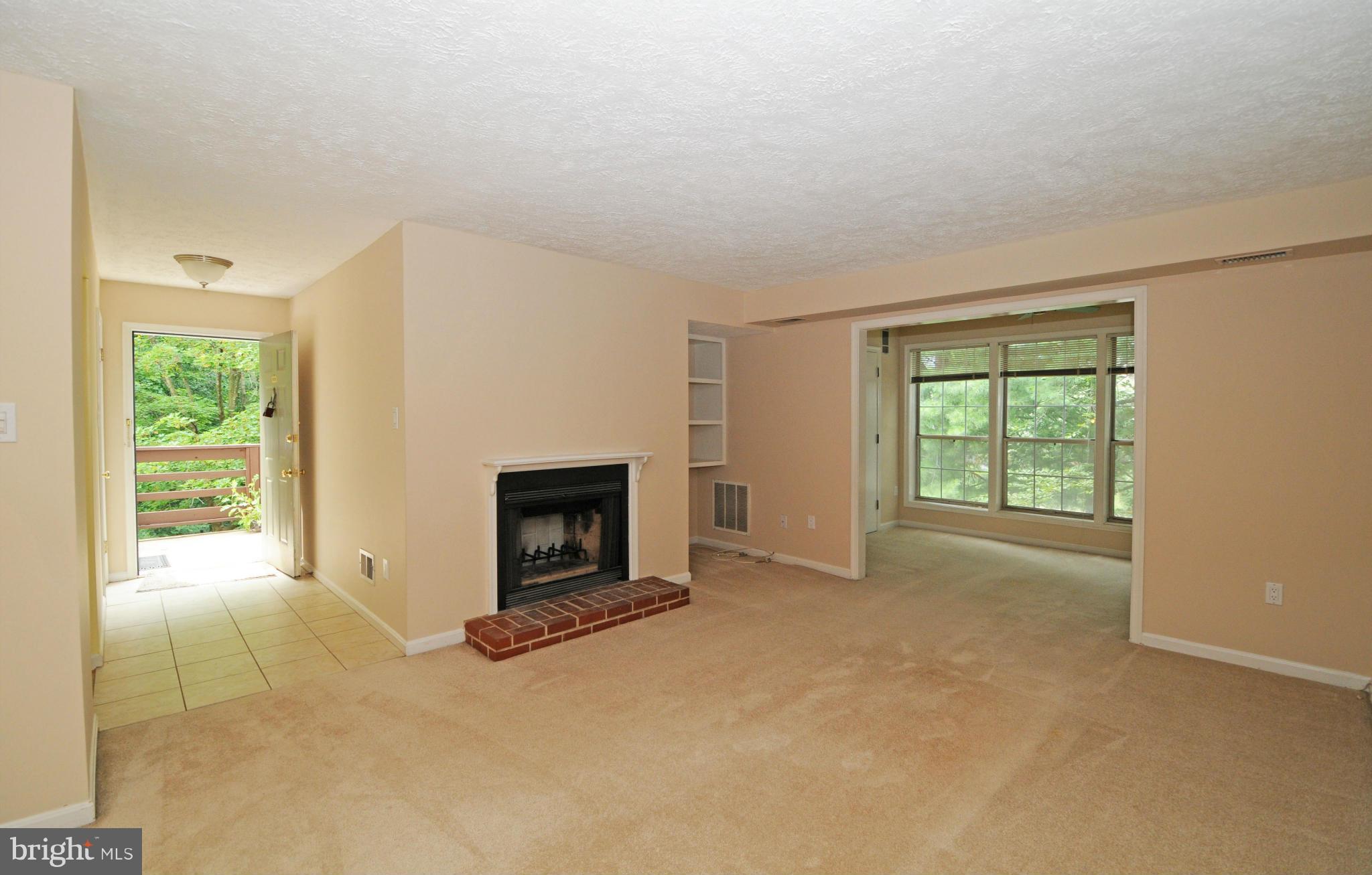 10125 Oakton Terrace Road, Unit 10125 Oakton, VA 22124 - Photo 13 of 30 ANOTHER VIEW OF THE LIVING ROOM