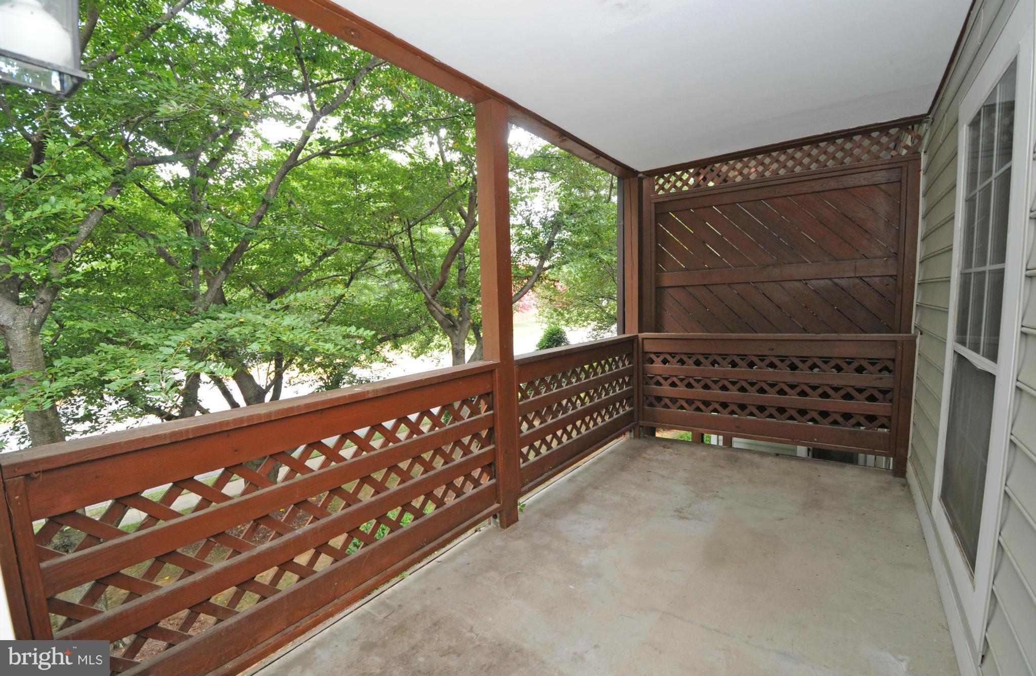 10125 Oakton Terrace Road, Unit 10125 Oakton, VA 22124 - Photo 17 of 30 EXIT TO DECK FROM THE DEN