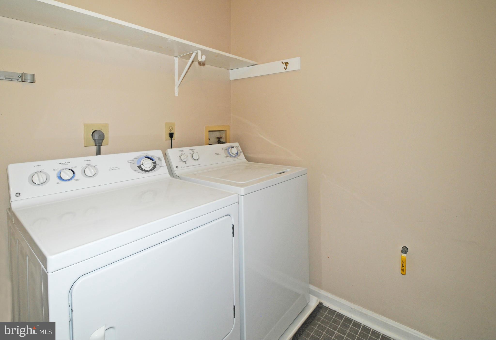 10125 Oakton Terrace Road, Unit 10125 Oakton, VA 22124 - Photo 25 of 30 SEPARATE LAUNDRY ROOM; FULL SIZE WASHER AND DRYER