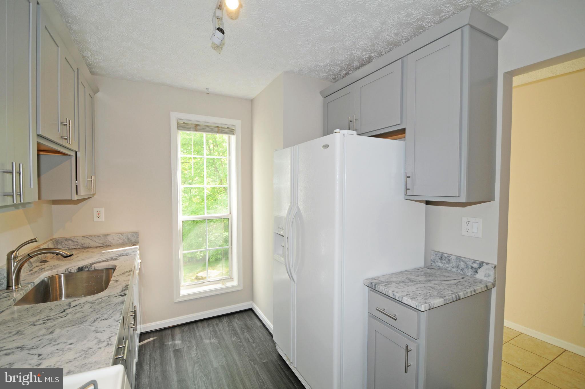 10125 Oakton Terrace Road, Unit 10125 Oakton, VA 22124 - Photo 9 of 30 SOFT CLOSE DRAWERS AND DOORS