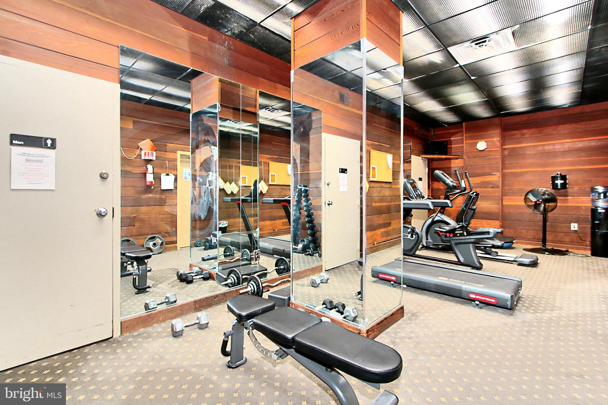 700 7th Street Southwest, Unit 730 Washington, DC 20024 - Photo 21 of 56 a view of a gym with wooden floor