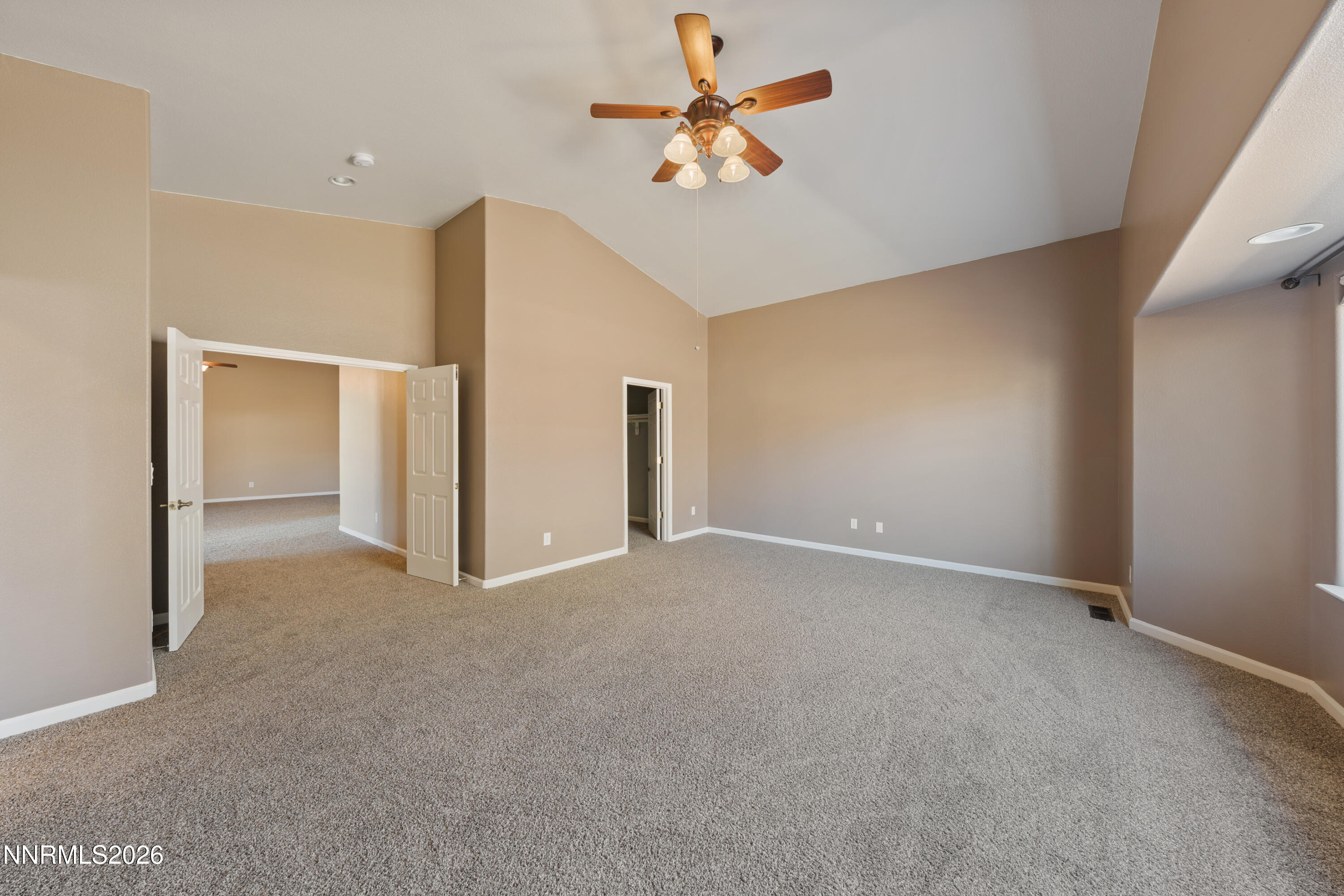 794 Mallard Way Fernley, NV 89408 - Photo 12 of 36 a view of a livingroom with a ceiling fan
