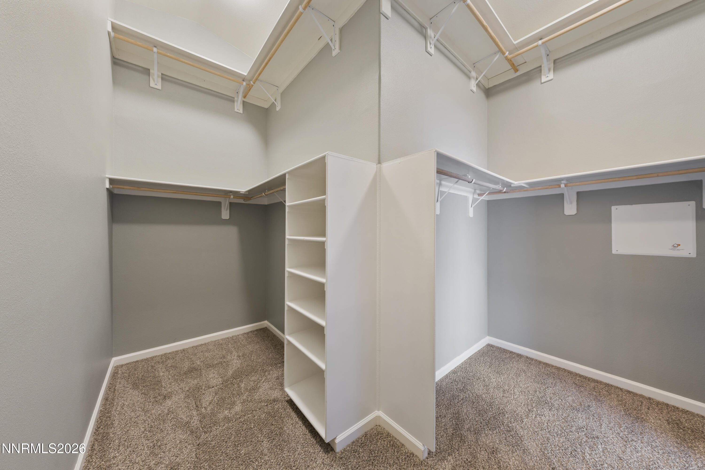 794 Mallard Way Fernley, NV 89408 - Photo 15 of 36 a view of walk in closet with empty racks