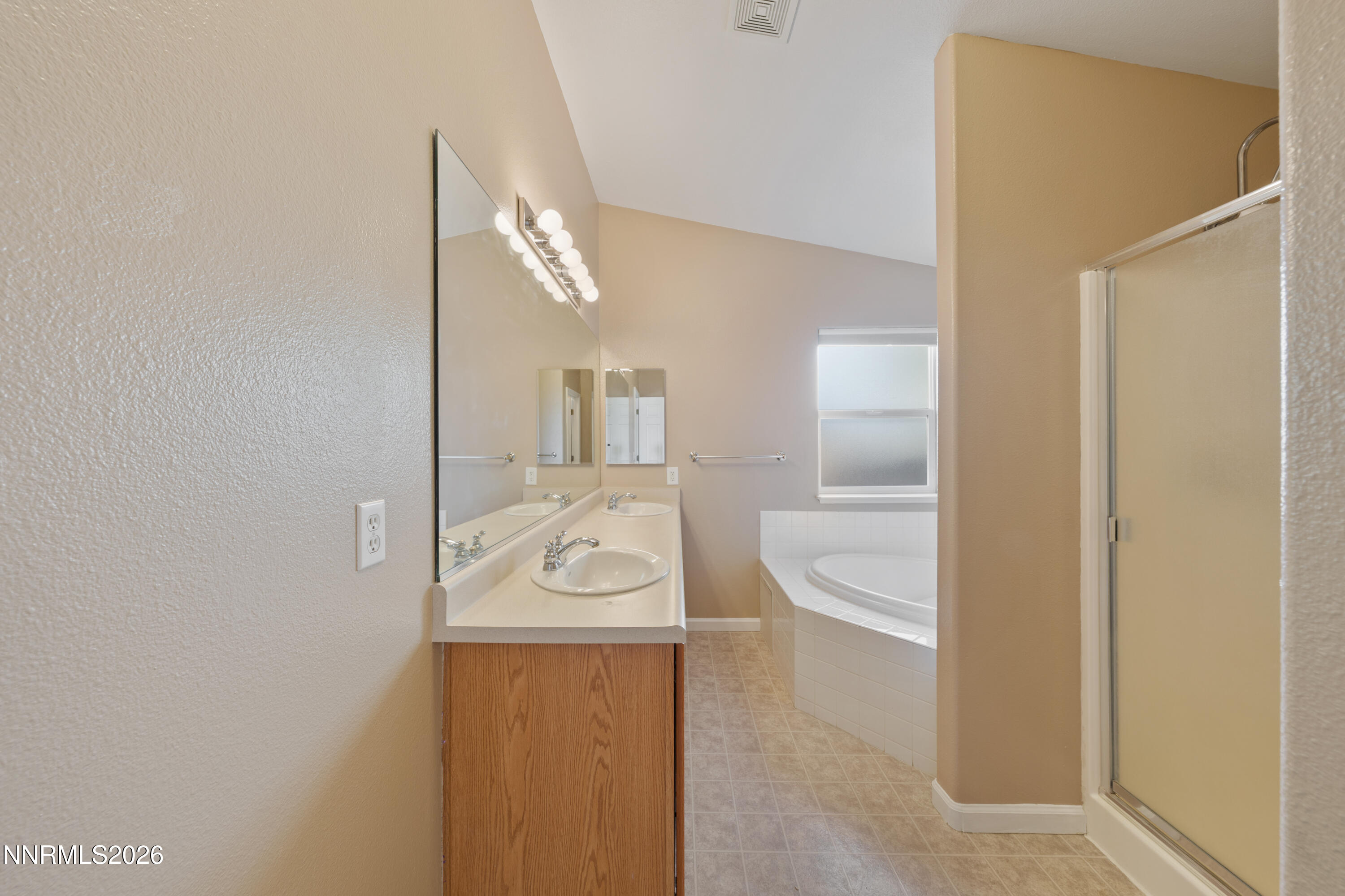794 Mallard Way Fernley, NV 89408 - Photo 17 of 36 a bathroom with a toilet sink and mirror