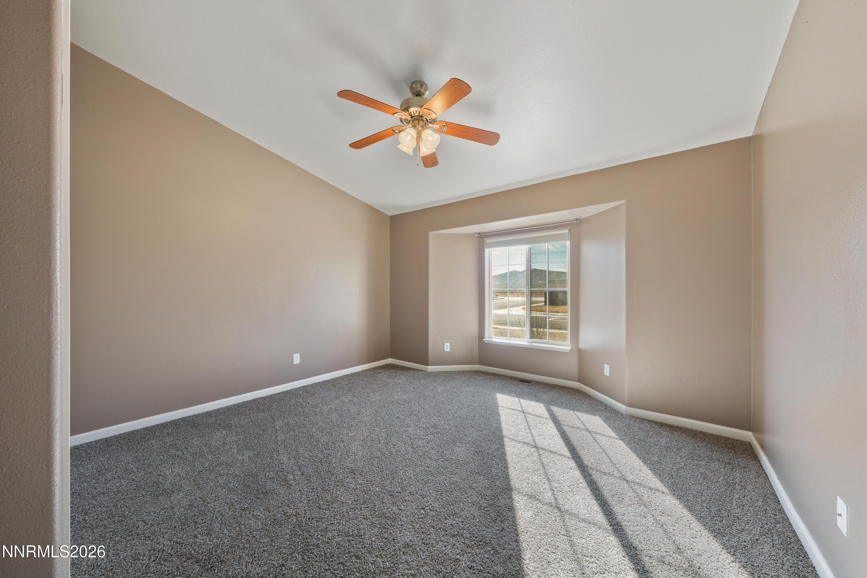794 Mallard Way Fernley, NV 89408 - Photo 21 of 36 a view of an empty room with window