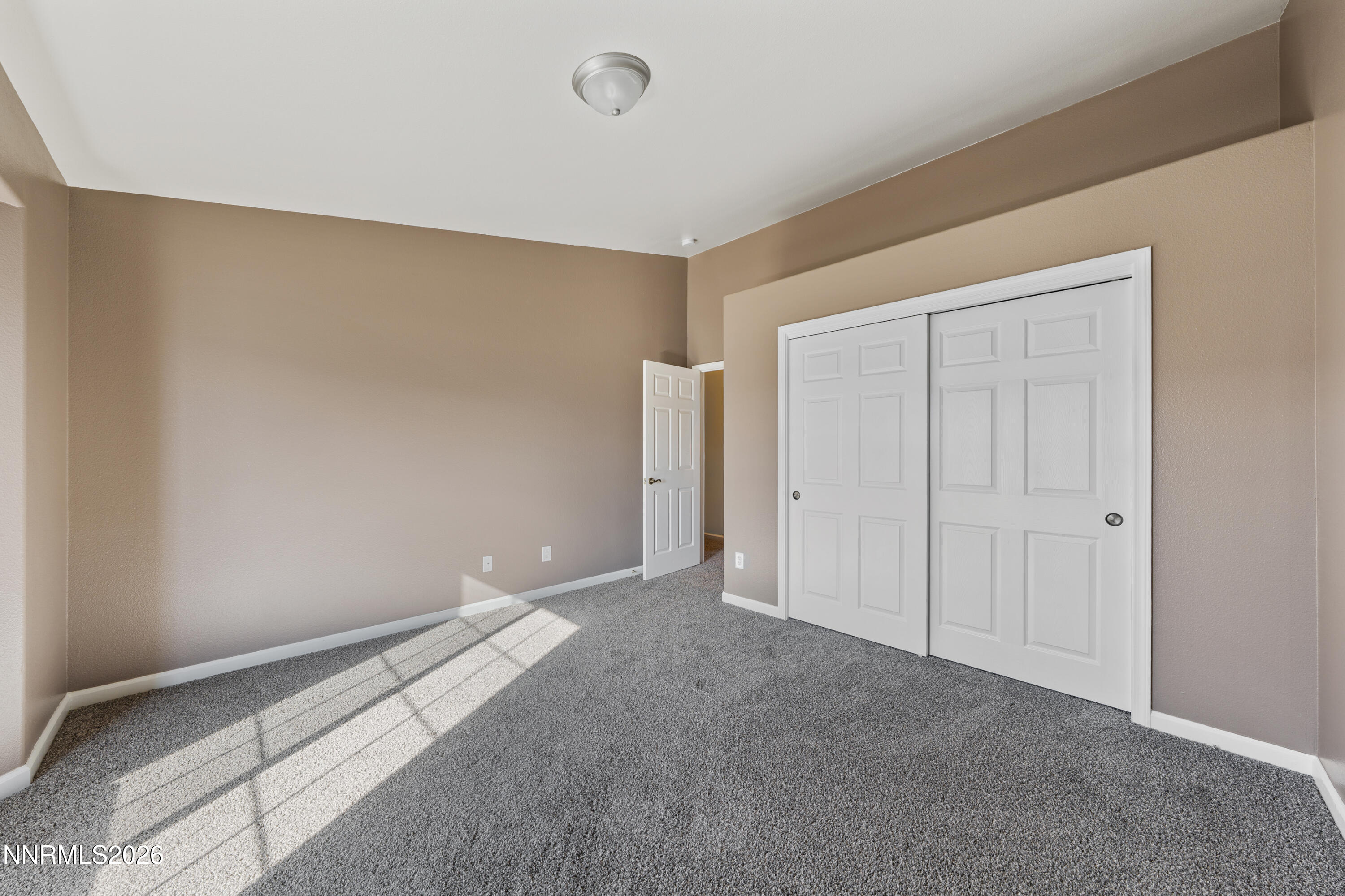 794 Mallard Way Fernley, NV 89408 - Photo 24 of 36 a view of room with window