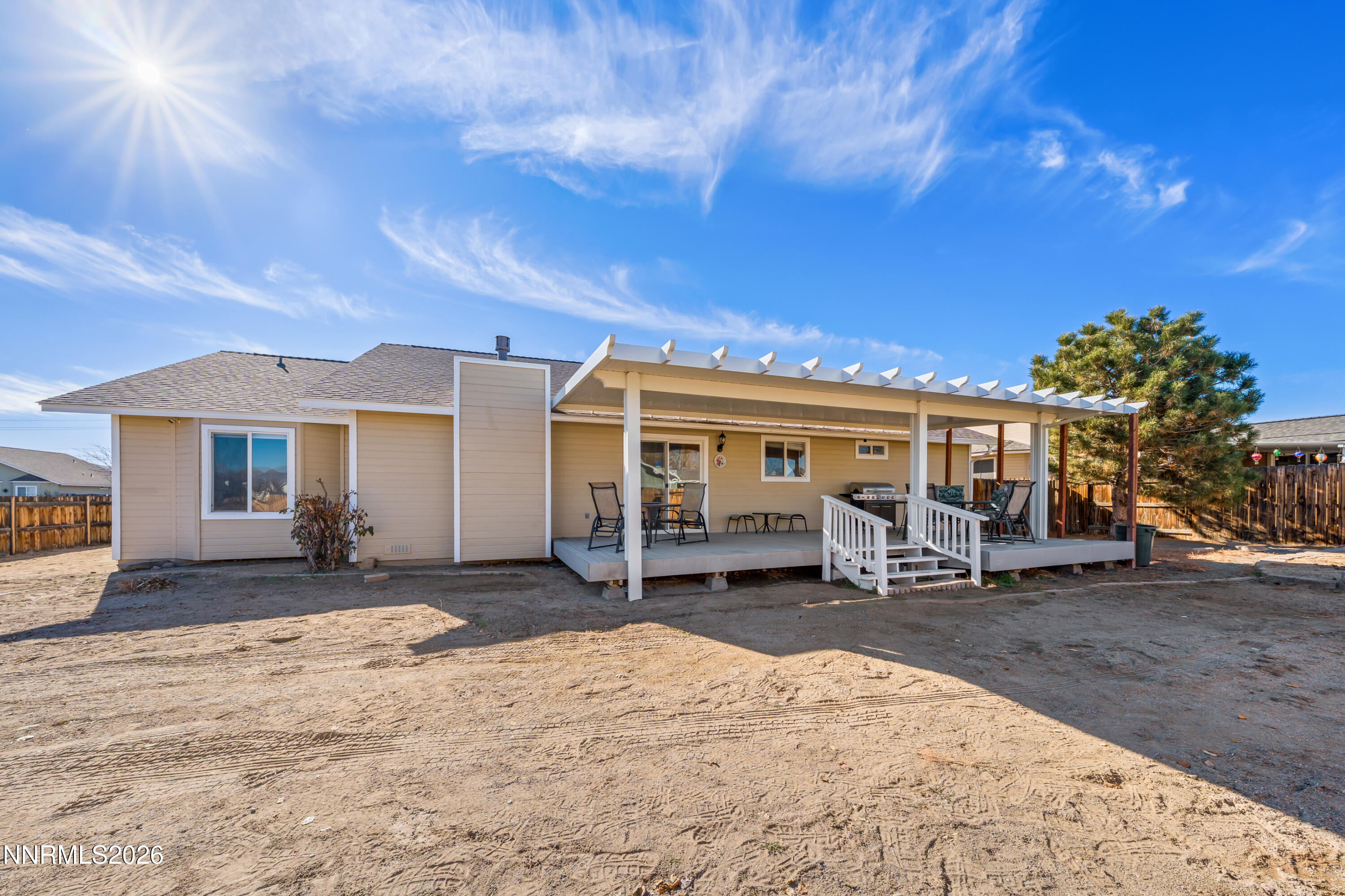 794 Mallard Way Fernley, NV 89408 - Photo 31 of 36 a view of a house with patio