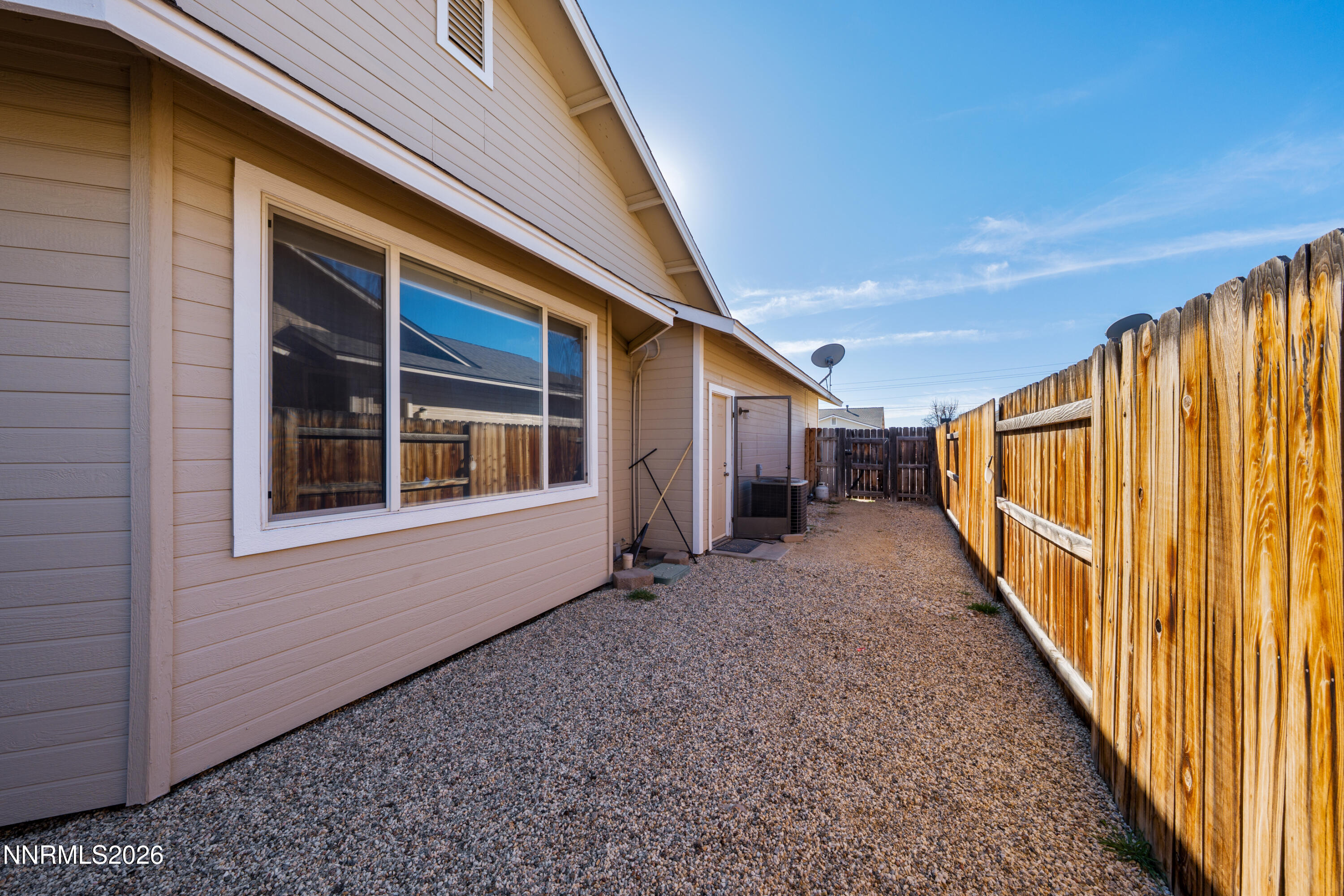 794 Mallard Way Fernley, NV 89408 - Photo 33 of 36 a view of house with the front door