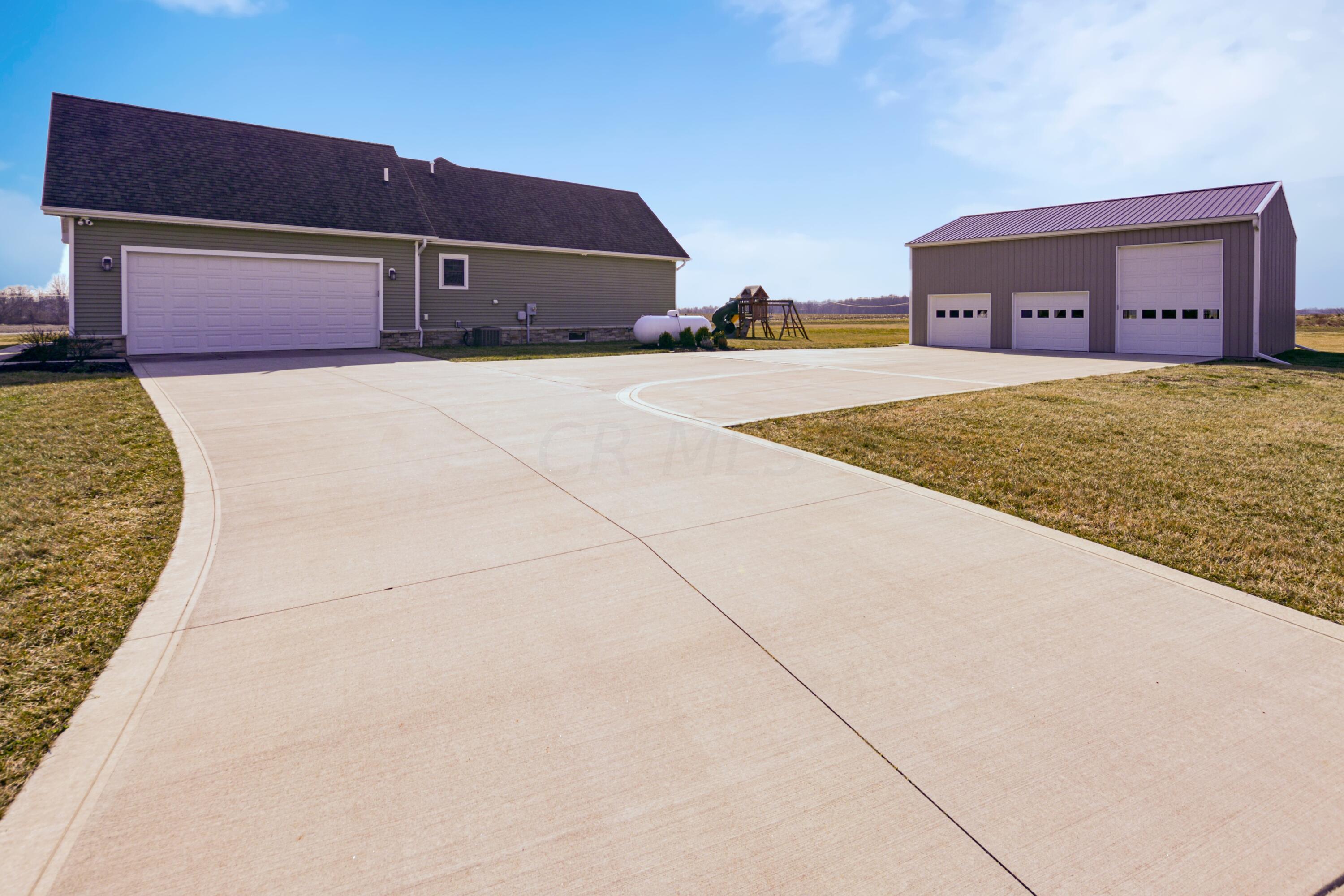 12800 Trenton Road Galena, OH 43021 - Photo 4 of 49 Side load garage and pole barn