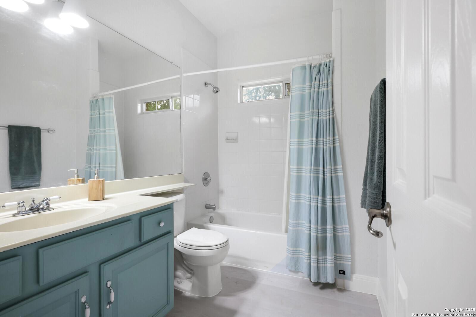 341 Indigo Run Drive Bulverde, TX 78163 - Photo 28 of 37 a bathroom with a sink a toilet and shower