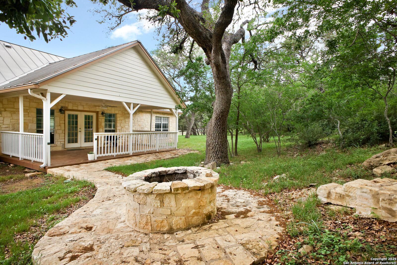 341 Indigo Run Drive Bulverde, TX 78163 - Photo 37 of 37 a view of a house with a backyard