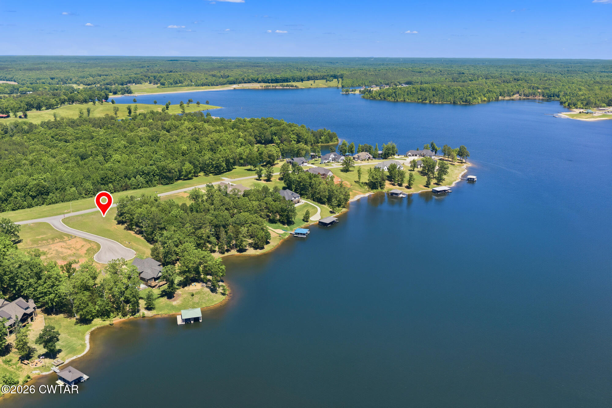Lot 118 Kyle Road Huntingdon, TN 38344 - Photo 1 of 16 an aerial view of ocean and residential houses with outdoor space and seating
