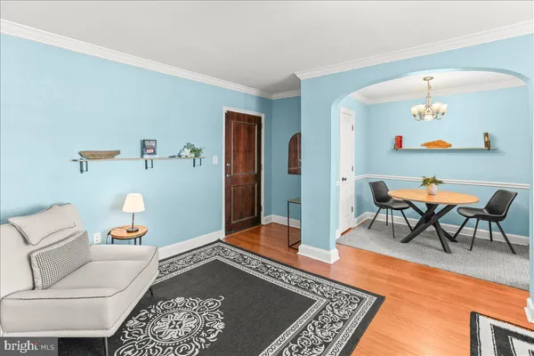 a living room with furniture and a table