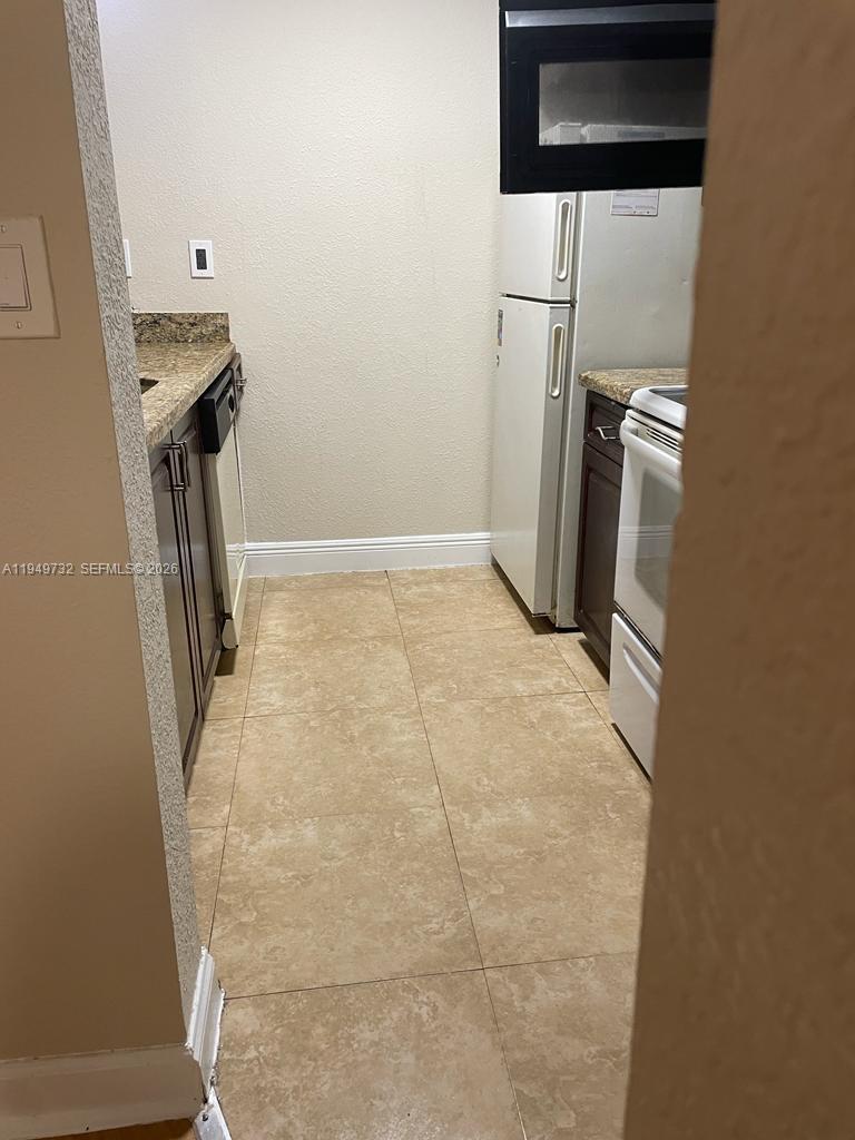7075 Northwest 186th Street, Unit C505 Hialeah, FL 33015 - Photo 3 of 11