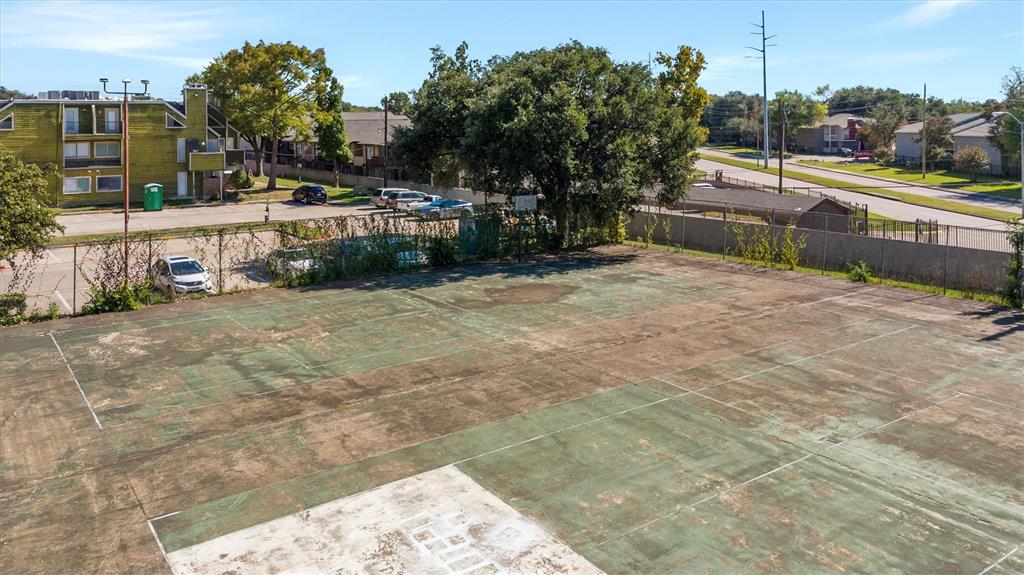 9807 Walnut Street, Unit 202 Dallas, TX 75243 - Photo 12 of 16 a view of a yard with a sitting area