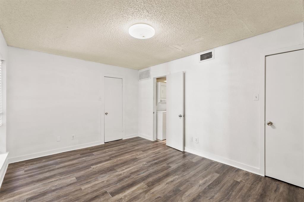 9807 Walnut Street, Unit 202 Dallas, TX 75243 - Photo 7 of 16 a view of empty room