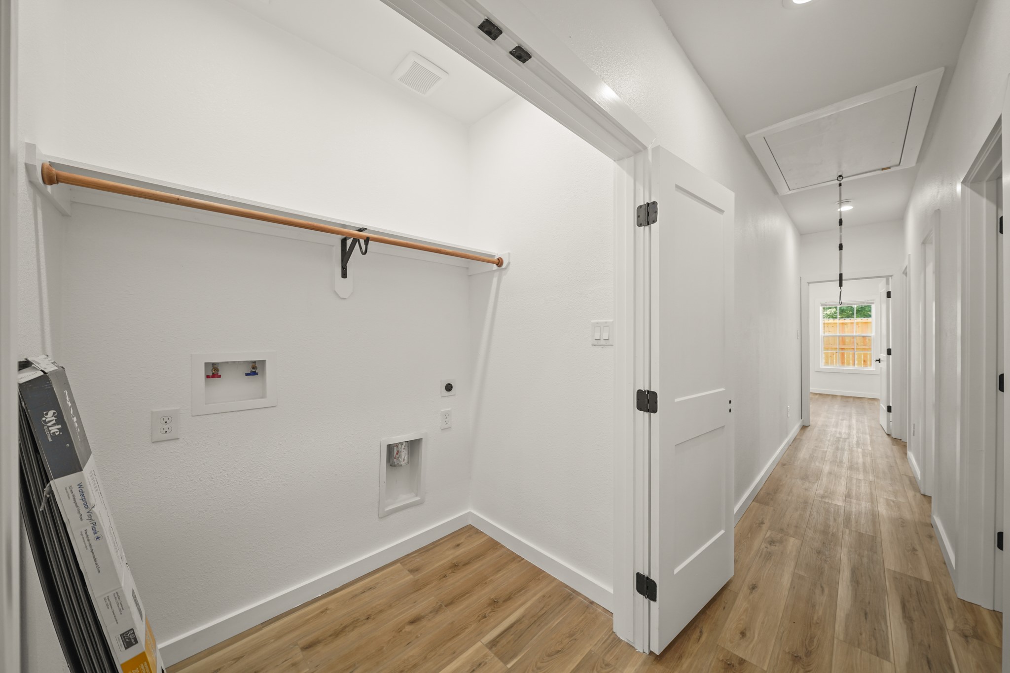 6206 Lyndhurst Drive, Unit AB Houston, TX 77087 - Photo 7 of 14 a view of a hallway with wooden floor