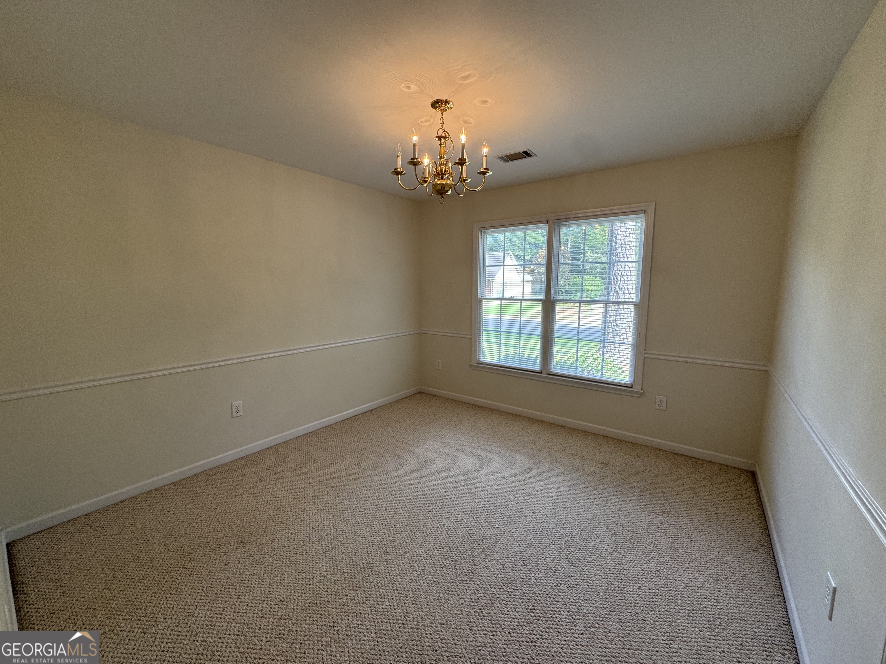 361 Brickleberry Ridge Athens, GA 30605 - Photo 11 of 23 wooden floor in an empty room with a window