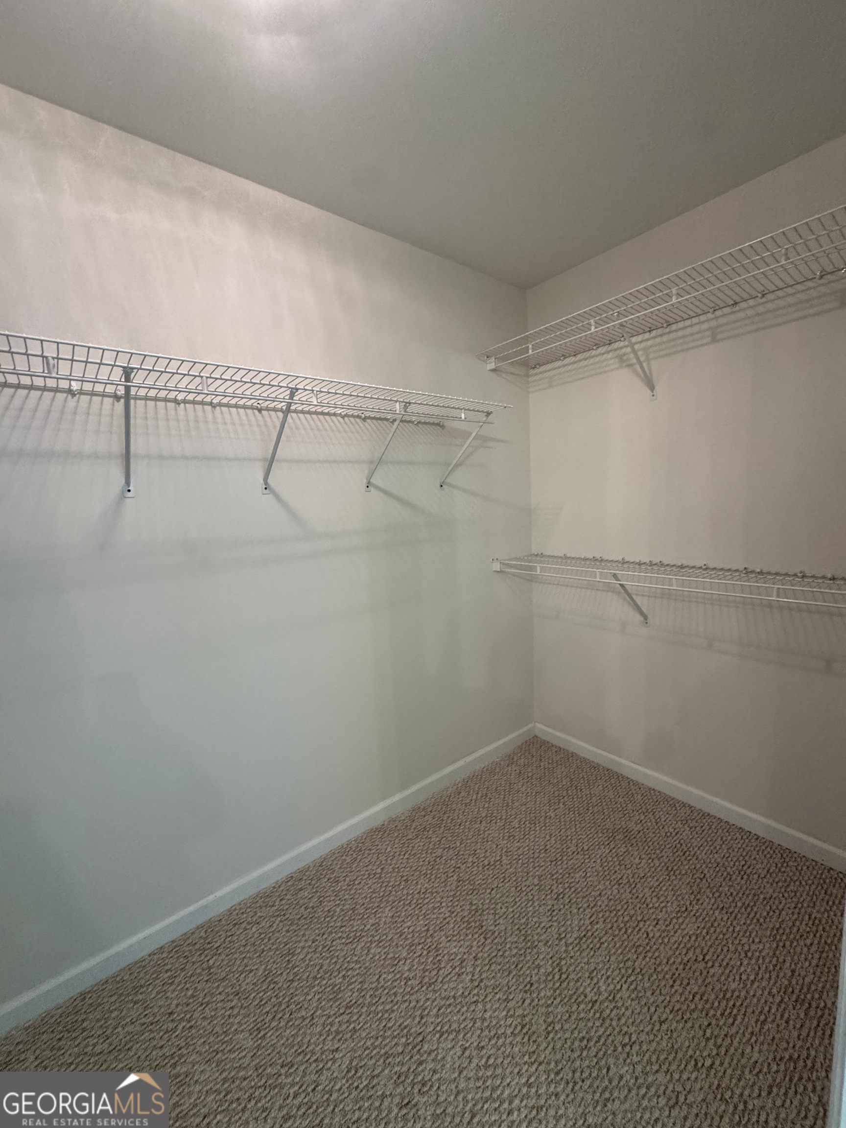 361 Brickleberry Ridge Athens, GA 30605 - Photo 19 of 23 a view of a room with racks on the wall