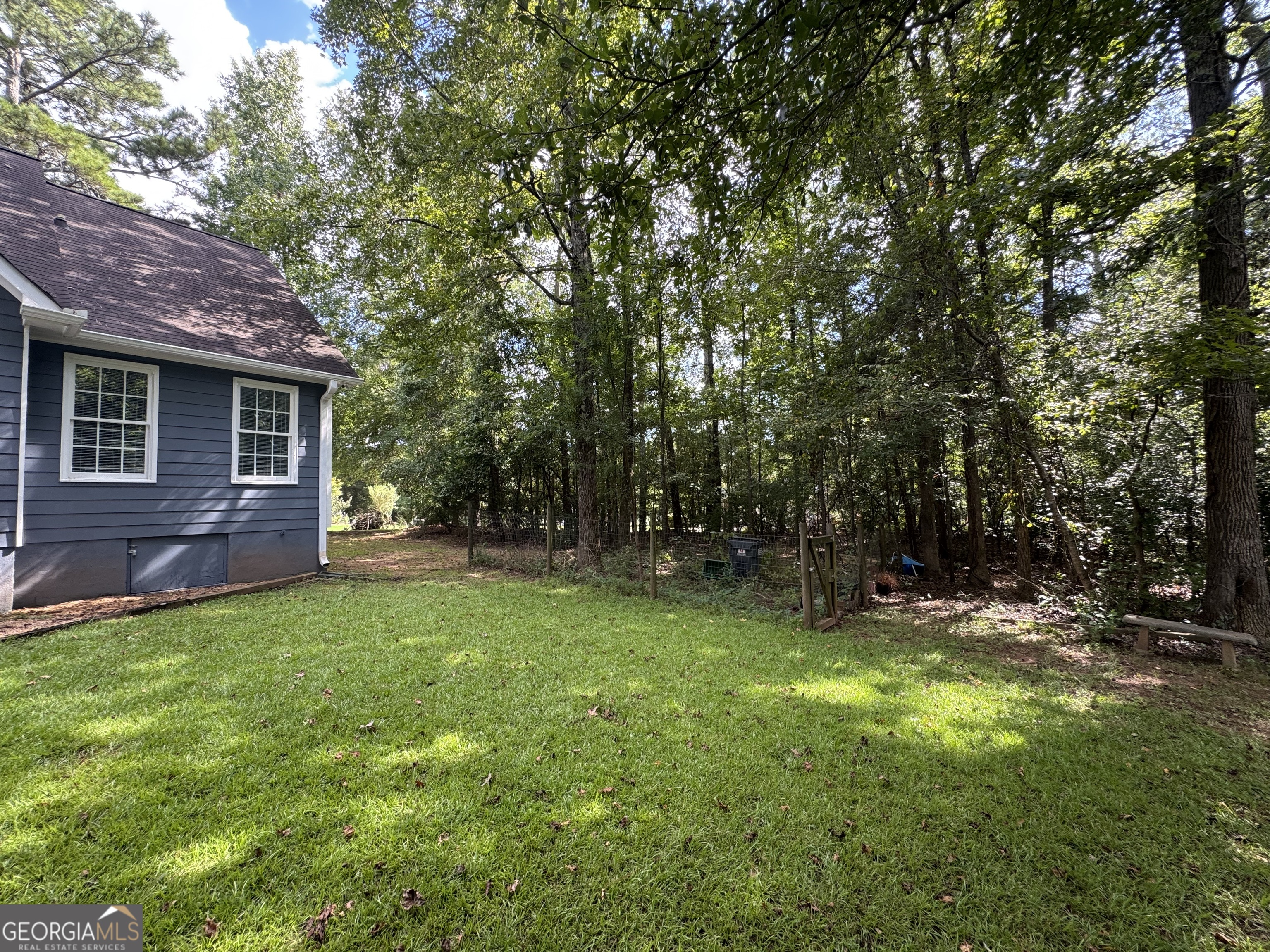 361 Brickleberry Ridge Athens, GA 30605 - Photo 22 of 23 a view of a backyard with a garden