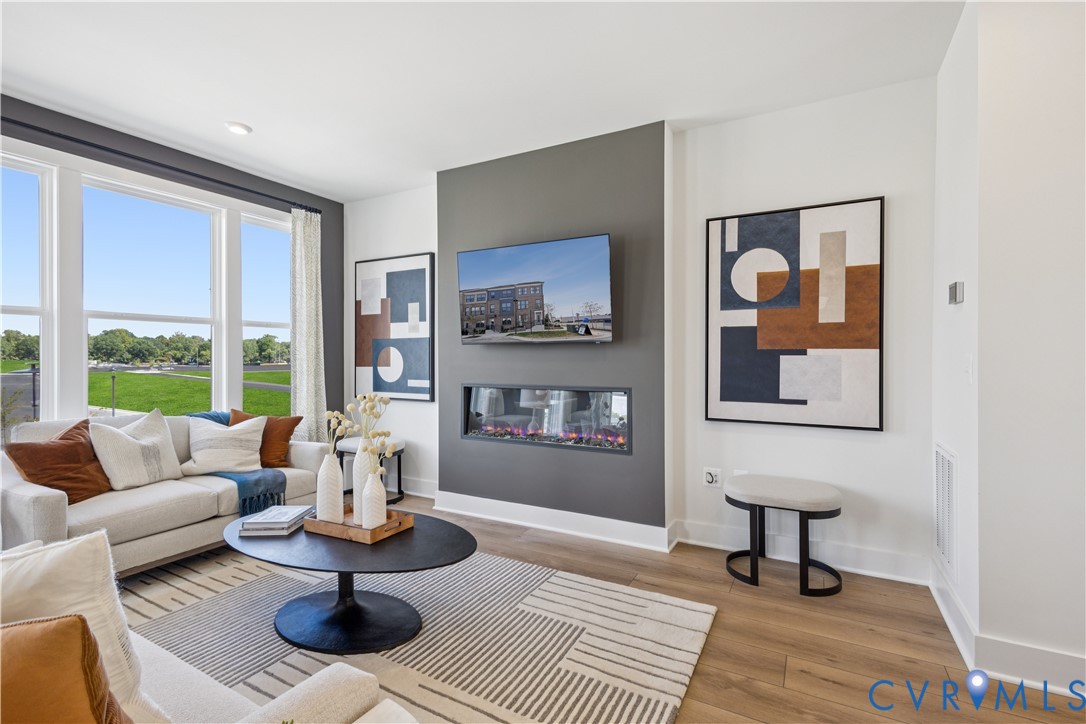 9434 Alquist Street Glen Allen, VA 23059 - Photo 14 of 45 a living room with furniture and a large window