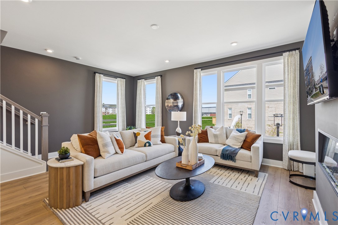 9434 Alquist Street Glen Allen, VA 23059 - Photo 16 of 45 a living room with furniture and a large window