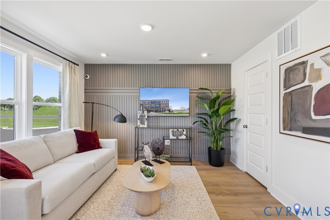 9434 Alquist Street Glen Allen, VA 23059 - Photo 19 of 45 a living room with furniture potted plant and a window