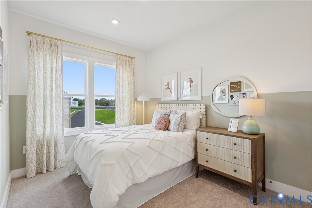 9434 Alquist Street Glen Allen, VA 23059 - Photo 25 of 45 a bedroom with a bed and a dresser