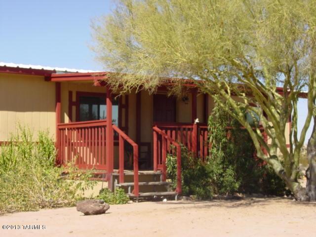 5201 North Lak A Yucca Road Tucson, AZ 85743 - Photo 1 of 19 a view of a house with a yard