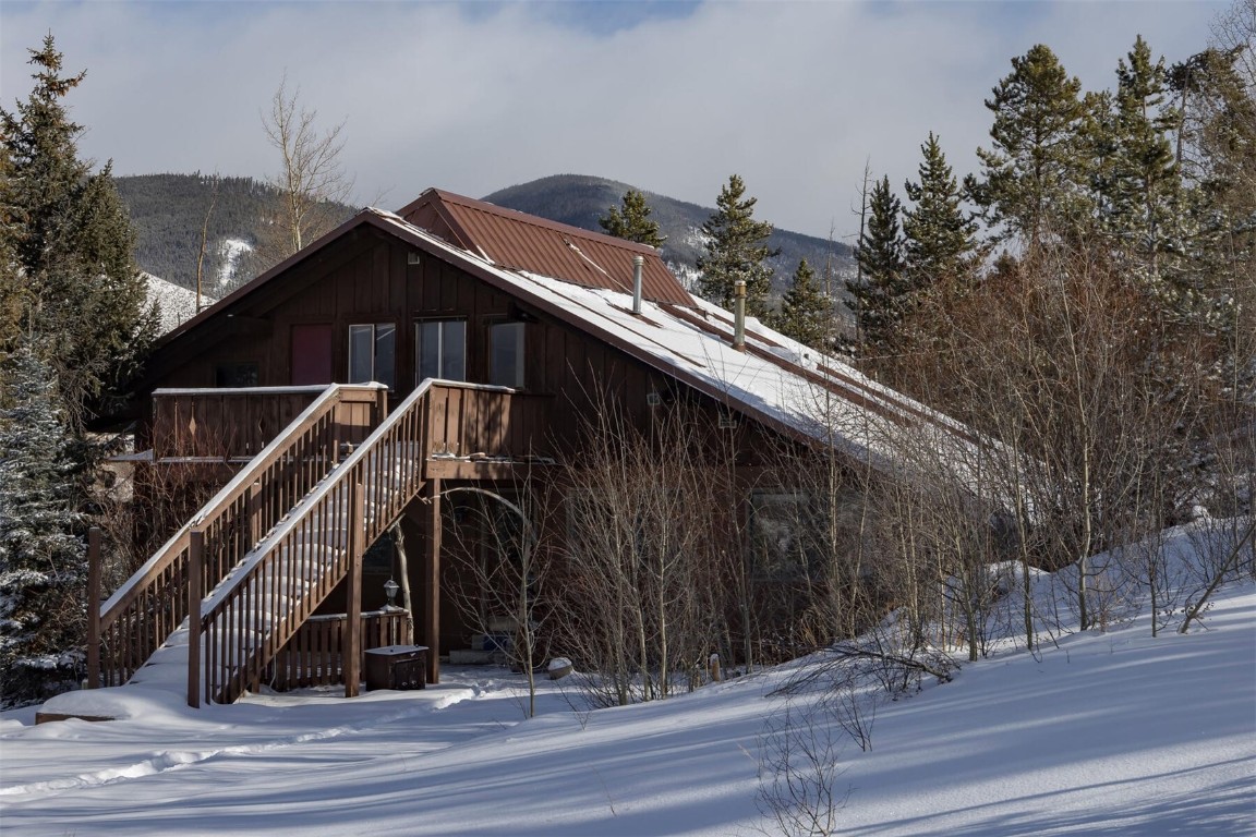 200 Evergreen Road Dillon, CO 80435 - Photo 2 of 35 a view of a wooden house with a street