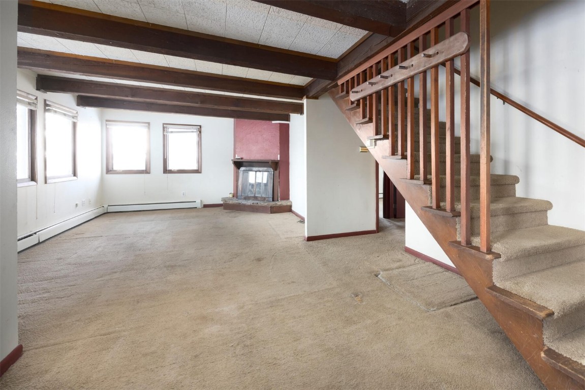 200 Evergreen Road Dillon, CO 80435 - Photo 6 of 35 a view of an empty room with stairs