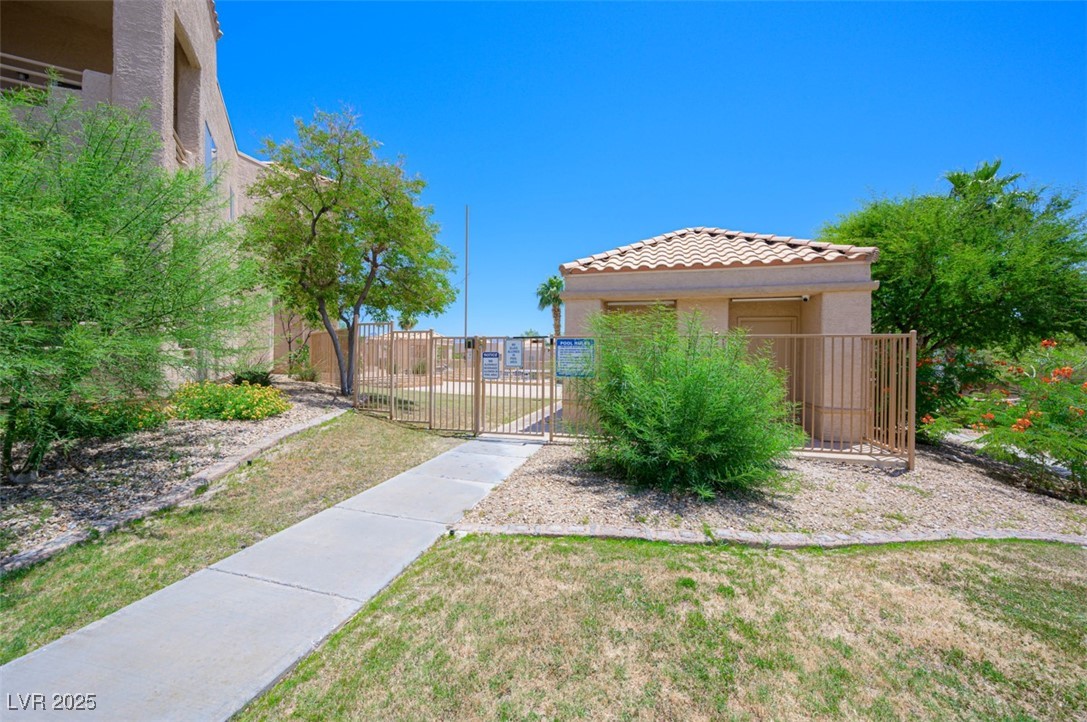 2240 Highpointe Drive, Unit 203 Laughlin, NV 89029 - Photo 10 of 38 View of yard featuring fence and a gate