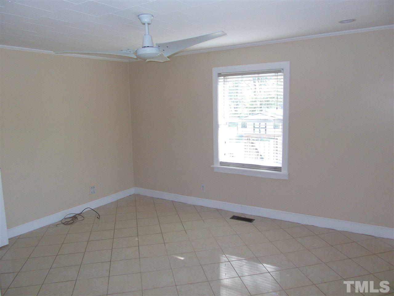 1102 Stallings Road Durham, NC 27703 - Photo 14 of 15 an empty room with a window