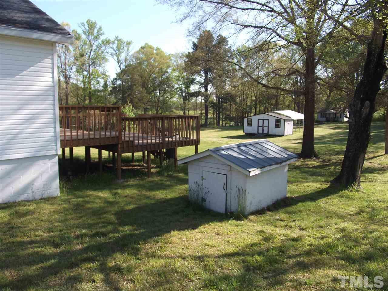 1102 Stallings Road Durham, NC 27703 - Photo 3 of 15 a view of a swimming pool with a patio