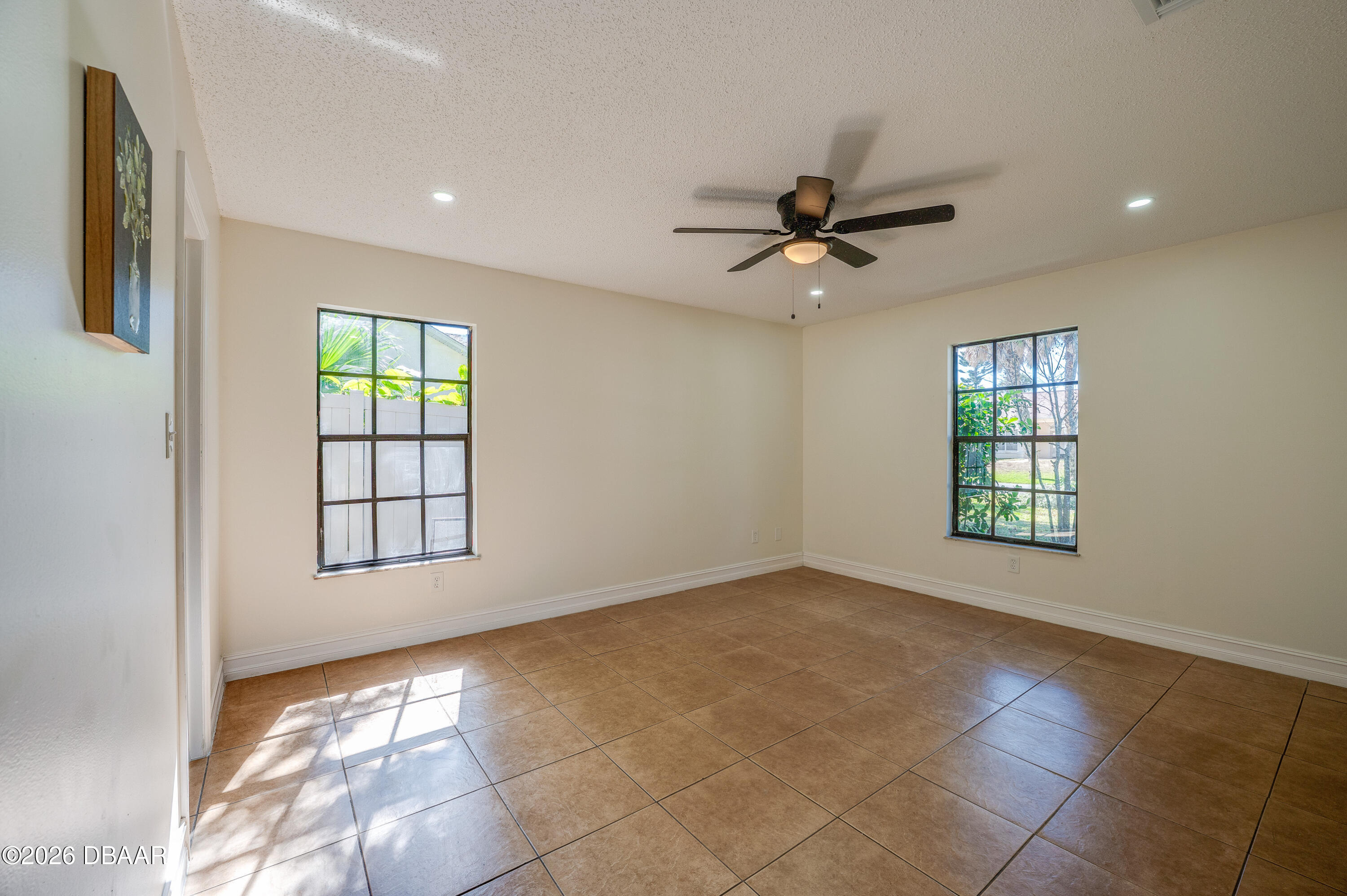 2425 Royal Palm Drive Edgewater, FL 32141 - Photo 16 of 41 a view of an empty room with a window