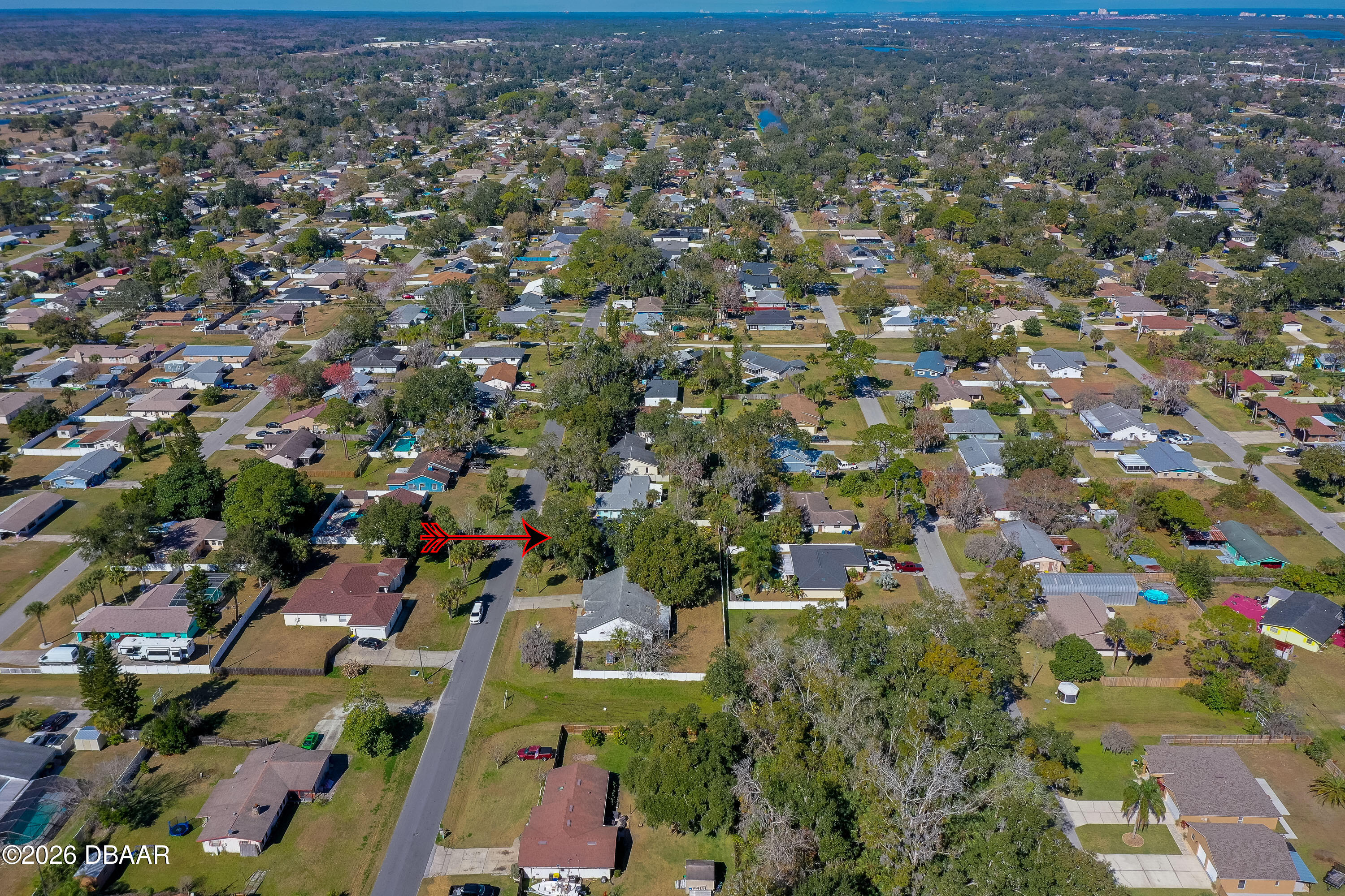 2425 Royal Palm Drive Edgewater, FL 32141 - Photo 39 of 41 an aerial view of a city with lots of residential buildings