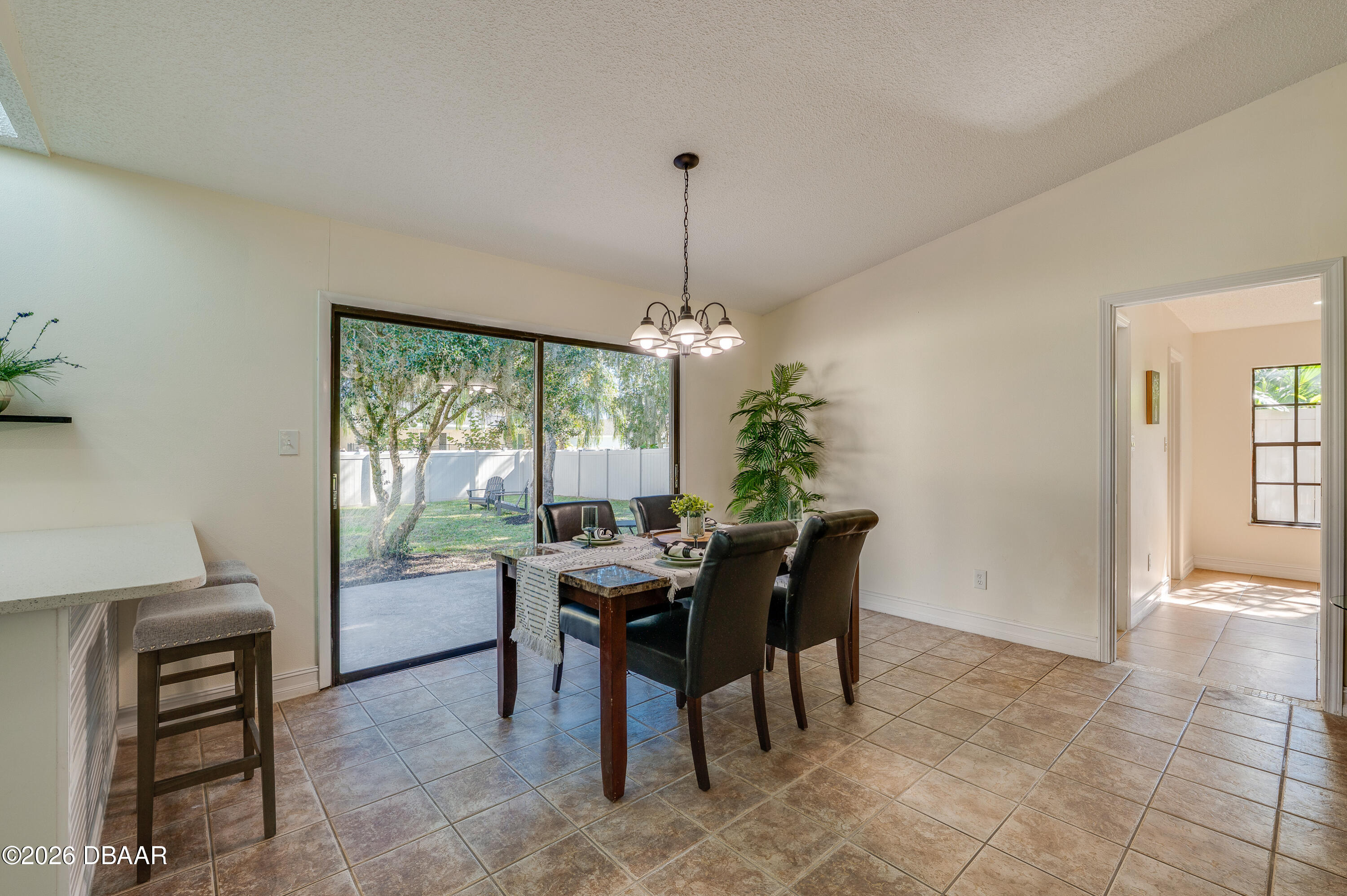 2425 Royal Palm Drive Edgewater, FL 32141 - Photo 9 of 41 a view of a dining room with furniture window and outside view