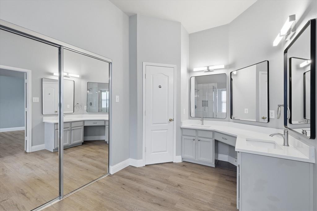 2616 Hollow Ridge Drive Denton, TX 76210 - Photo 20 of 31 Bathroom featuring light wood-finish flooring and light gray walls